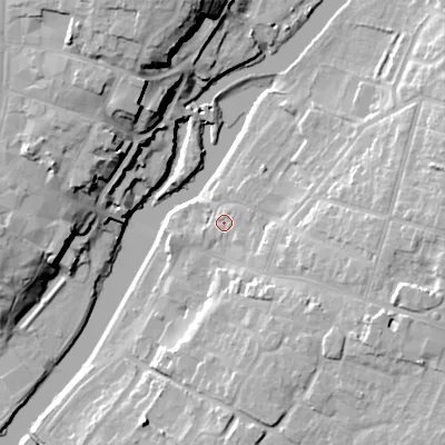 Shaded relief map of the ground around WR113AA, computed from Environment Agency LiDAR. The ground here sits at about 24 m above sea level and falls 23 m across the surrounding 800 m. Surface water reaching this point runs off ground lying to the east, 1.8 m higher.