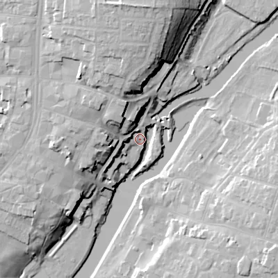 Shaded relief map of the ground around WR114HT, computed from Environment Agency LiDAR. The ground here sits at about 24 m above sea level and falls 26 m across the surrounding 800 m. Surface water reaching this point runs off ground lying to the west, 5.8 m higher.
