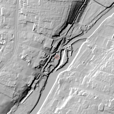 Shaded relief map of the ground around WR114HU, computed from Environment Agency LiDAR. The ground here sits at about 25 m above sea level and falls 26 m across the surrounding 800 m. Surface water reaching this point runs off ground lying to the west-north-west, 6.0 m higher.