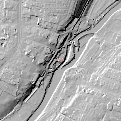 Shaded relief map of the ground around WR114HX, computed from Environment Agency LiDAR. The ground here sits at about 24 m above sea level and falls 24 m across the surrounding 800 m. Surface water reaching this point runs off ground lying to the west, 9.1 m higher.