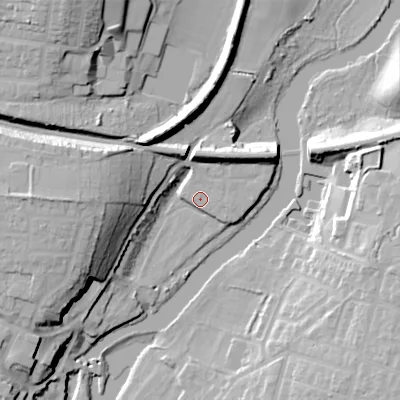 Shaded relief map of the ground around WR114RN, computed from Environment Agency LiDAR. The ground here sits at about 26 m above sea level and falls 29 m across the surrounding 800 m. Surface water reaching this point runs off ground lying to the west, 22.3 m higher.