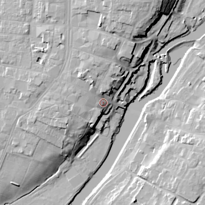 Shaded relief map of the ground around WR114RY, computed from Environment Agency LiDAR. The ground here sits at about 32 m above sea level and falls 23 m across the surrounding 800 m. Surface water reaching this point runs off ground lying to the north-west, 7.7 m higher.
