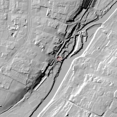 Shaded relief map of the ground around WR114SF, computed from Environment Agency LiDAR. The ground here sits at about 26 m above sea level and falls 23 m across the surrounding 800 m. Surface water reaching this point runs off ground lying to the north, 18.7 m higher.