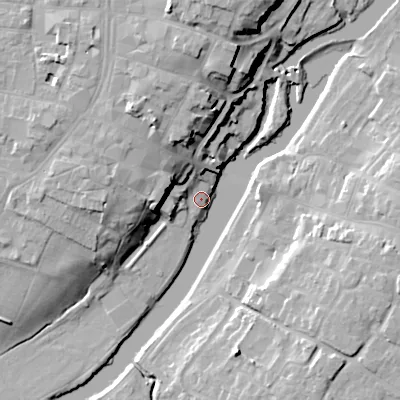 Shaded relief map of the ground around WR114SL, computed from Environment Agency LiDAR. The ground here sits at about 23 m above sea level and falls 21 m across the surrounding 800 m. Surface water reaching this point runs off ground lying to the north-west, 15.9 m higher.
