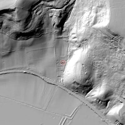 Shaded relief map of the ground around WR114TE, computed from Environment Agency LiDAR. The ground here sits at about 34 m above sea level and falls 104 m across the surrounding 800 m. Surface water reaching this point runs off ground lying to the north-east, 92.1 m higher.