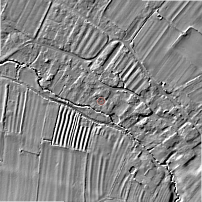 Shaded relief map of the ground around WR117JR, computed from Environment Agency LiDAR. The ground here sits at about 39 m above sea level and falls 7 m across the surrounding 800 m. Surface water reaching this point runs off ground lying to the north-east, 1.4 m higher.