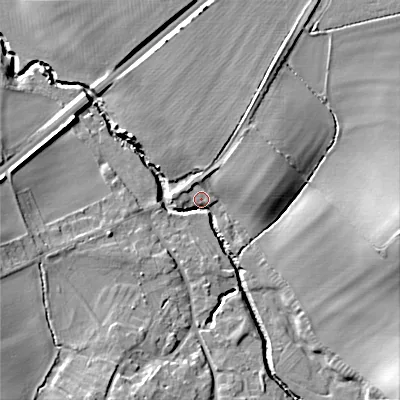 Shaded relief map of the ground around WR117UX, computed from Environment Agency LiDAR. The ground here sits at about 34 m above sea level and falls 18 m across the surrounding 800 m. Surface water reaching this point runs off ground lying to the east, 17.1 m higher.