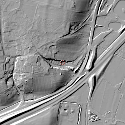 Shaded relief map of the ground around WR118NR, computed from Environment Agency LiDAR. The ground here sits at about 32 m above sea level and falls 21 m across the surrounding 800 m. Surface water reaching this point runs off ground lying to the west-north-west, 15.3 m higher.