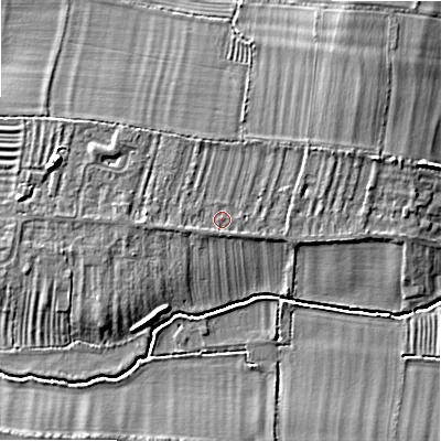 Shaded relief map of the ground around WR118TP, computed from Environment Agency LiDAR. The ground here sits at about 35 m above sea level and falls 9 m across the surrounding 800 m. Surface water reaching this point runs off ground lying to the east-north-east, 3.2 m higher.