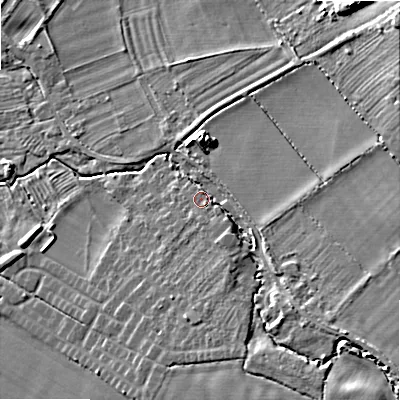 Shaded relief map of the ground around WR127QH, computed from Environment Agency LiDAR. The ground here sits at about 62 m above sea level and falls 23 m across the surrounding 800 m. Surface water reaching this point runs off ground lying to the south-east, 8.3 m higher.