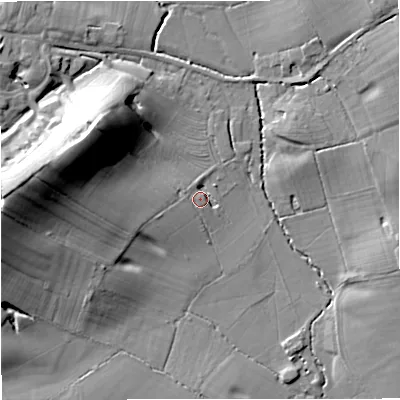 Shaded relief map of the ground around WR136LW, computed from Environment Agency LiDAR. The ground here sits at about 29 m above sea level and falls 25 m across the surrounding 800 m. Surface water reaching this point runs off ground lying to the west-north-west, 20.1 m higher.
