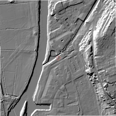 Shaded relief map of the ground around WR53DA, computed from Environment Agency LiDAR. The ground here sits at about 16 m above sea level and falls 24 m across the surrounding 800 m. Surface water reaching this point runs off ground lying to the east-north-east, 20.9 m higher.