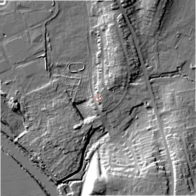 Shaded relief map of the ground around WR53DH, computed from Environment Agency LiDAR. The ground here sits at about 18 m above sea level and falls 22 m across the surrounding 800 m. Surface water reaching this point runs off ground lying to the south, 3.9 m higher.