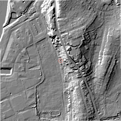 Shaded relief map of the ground around WR53DQ, computed from Environment Agency LiDAR. The ground here sits at about 16 m above sea level and falls 23 m across the surrounding 800 m. Surface water reaching this point runs off ground lying to the north-north-east, 18.6 m higher.