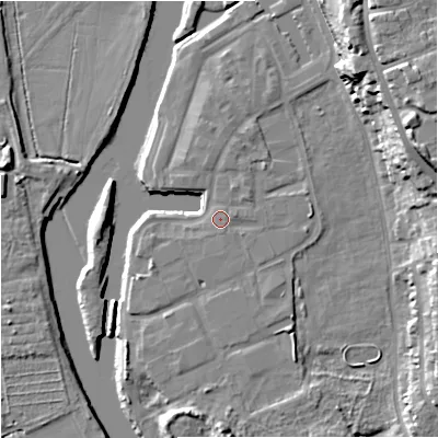 Shaded relief map of the ground around WR53FT, computed from Environment Agency LiDAR. The ground here sits at about 16 m above sea level and falls 23 m across the surrounding 800 m. Surface water reaching this point runs off ground lying to the north-north-east, 1.3 m higher.
