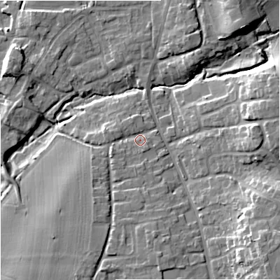 Shaded relief map of the ground around WR53JB, computed from Environment Agency LiDAR. The ground here sits at about 16 m above sea level and falls 15 m across the surrounding 800 m. Surface water reaching this point runs off ground lying to the south, 4.6 m higher.