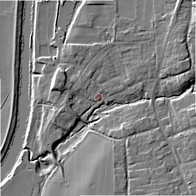 Shaded relief map of the ground around WR53JQ, computed from Environment Agency LiDAR. The ground here sits at about 14 m above sea level and falls 12 m across the surrounding 800 m. Surface water reaching this point runs off ground lying to the west-south-west, 6.6 m higher.