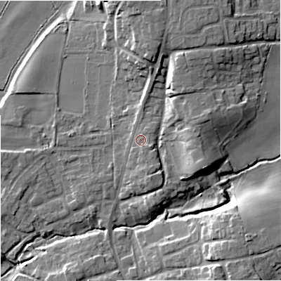 Shaded relief map of the ground around WR53JY, computed from Environment Agency LiDAR. The ground here sits at about 18 m above sea level and falls 15 m across the surrounding 800 m. Surface water reaching this point runs off ground lying to the north-east, 1.6 m higher.