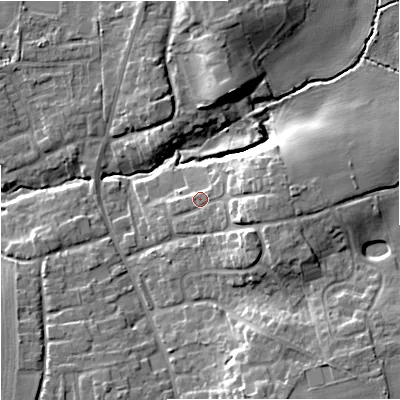 Shaded relief map of the ground around WR53NT, computed from Environment Agency LiDAR. The ground here sits at about 18 m above sea level and falls 14 m across the surrounding 800 m. Surface water reaching this point runs off ground lying to the east, 6.4 m higher.