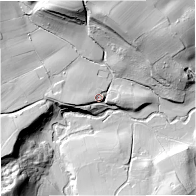 Shaded relief map of the ground around WR65HR, computed from Environment Agency LiDAR. The ground here sits at about 49 m above sea level and falls 69 m across the surrounding 800 m. Surface water reaching this point runs off ground lying to the west, 15.3 m higher.