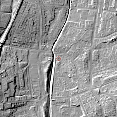 Shaded relief map of the ground around WS100HF, computed from Environment Agency LiDAR. The ground here sits at about 115 m above sea level and falls 16 m across the surrounding 800 m. Surface water reaching this point runs off ground lying to the south-east, 6.9 m higher.