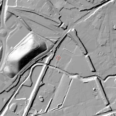Shaded relief map of the ground around WS100PB, computed from Environment Agency LiDAR. The ground here sits at about 120 m above sea level and falls 27 m across the surrounding 800 m. Surface water reaching this point runs off ground lying to the west, 5.3 m higher.