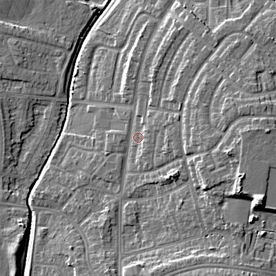 Shaded relief map of the ground around WS100TJ, computed from Environment Agency LiDAR. The ground here sits at about 117 m above sea level and falls 16 m across the surrounding 800 m. Surface water reaching this point runs off ground lying to the north-east, 4.7 m higher.