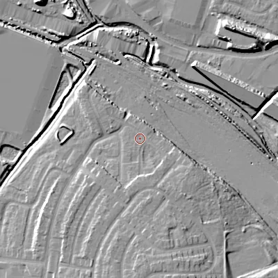 Shaded relief map of the ground around WS100TR, computed from Environment Agency LiDAR. The ground here sits at about 117 m above sea level and falls 16 m across the surrounding 800 m. Surface water reaching this point runs off ground lying to the south, 3.2 m higher.