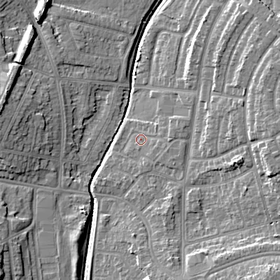 Shaded relief map of the ground around WS100TS, computed from Environment Agency LiDAR. The ground here sits at about 116 m above sea level and falls 13 m across the surrounding 800 m. Surface water reaching this point runs off ground lying to the south-east, 9.2 m higher.