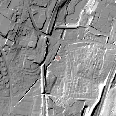 Shaded relief map of the ground around WS110EJ, computed from Environment Agency LiDAR. The ground here sits at about 128 m above sea level and falls 37 m across the surrounding 800 m. Surface water reaching this point runs off ground lying to the west-north-west, 12.9 m higher.