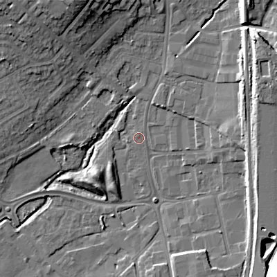 Shaded relief map of the ground around WS110JB, computed from Environment Agency LiDAR. The ground here sits at about 122 m above sea level and falls 21 m across the surrounding 800 m. Surface water reaching this point runs off ground lying to the east-north-east, 9.8 m higher.