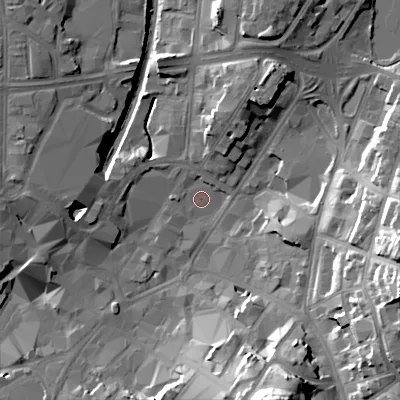 Shaded relief map of the ground around WS11DH, computed from Environment Agency LiDAR. The ground here sits at about 121 m above sea level and falls 32 m across the surrounding 800 m. Surface water reaching this point runs off ground lying to the north, 1.8 m higher.