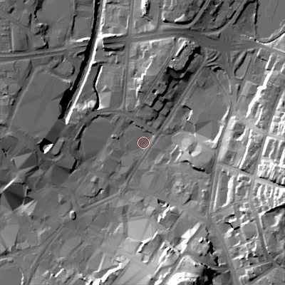 Shaded relief map of the ground around WS11TR, computed from Environment Agency LiDAR. The ground here sits at about 121 m above sea level and falls 34 m across the surrounding 800 m. Surface water reaching this point runs off ground lying to the north-north-east, 10.5 m higher.