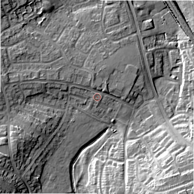 Shaded relief map of the ground around WS137PG, computed from Environment Agency LiDAR. The ground here sits at about 77 m above sea level and falls 23 m across the surrounding 800 m. Surface water reaching this point runs off ground lying to the north, 2.4 m higher.