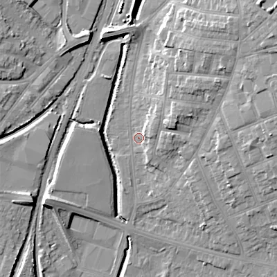 Shaded relief map of the ground around WS14DH, computed from Environment Agency LiDAR. The ground here sits at about 115 m above sea level and falls 18 m across the surrounding 800 m. Surface water reaching this point runs off ground lying to the north-east, 12.8 m higher.