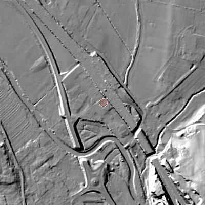 Shaded relief map of the ground around WS152HQ, computed from Environment Agency LiDAR. The ground here sits at about 69 m above sea level and falls 23 m across the surrounding 800 m. Surface water reaching this point runs off ground lying to the north-north-east, 3.6 m higher.