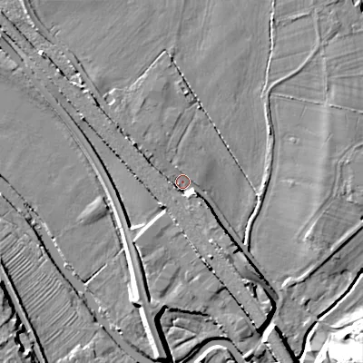 Shaded relief map of the ground around WS153HE, computed from Environment Agency LiDAR. The ground here sits at about 69 m above sea level and falls 11 m across the surrounding 800 m. Surface water reaching this point runs off ground lying to the south-south-east, 4.3 m higher.