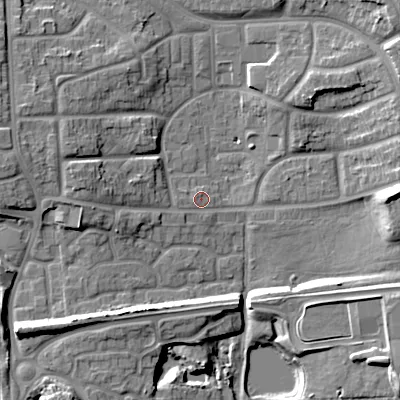 Shaded relief map of the ground around WS27HR, computed from Environment Agency LiDAR. The ground here sits at about 130 m above sea level and falls 15 m across the surrounding 800 m. Surface water reaching this point runs off ground lying to the west, 7.3 m higher.