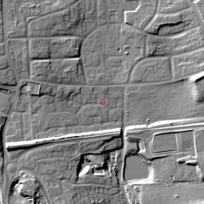 Shaded relief map of the ground around WS27RG, computed from Environment Agency LiDAR. The ground here sits at about 130 m above sea level and falls 15 m across the surrounding 800 m. Surface water reaching this point runs off ground lying to the west-north-west, 5.1 m higher.
