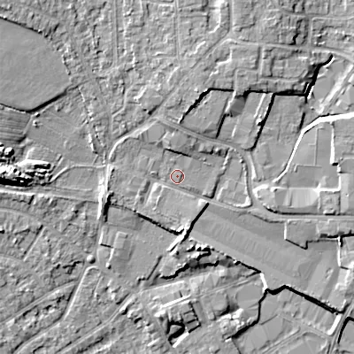 Shaded relief map of the ground around WV124LH, computed from Environment Agency LiDAR. The ground here sits at about 133 m above sea level and falls 11 m across the surrounding 800 m. Surface water reaching this point runs off ground lying to the north, 2.6 m higher.