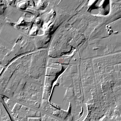 Shaded relief map of the ground around WV12TR, computed from Environment Agency LiDAR. The ground here sits at about 134 m above sea level and falls 10 m across the surrounding 800 m. Surface water reaching this point runs off ground lying to the south, 9.0 m higher.