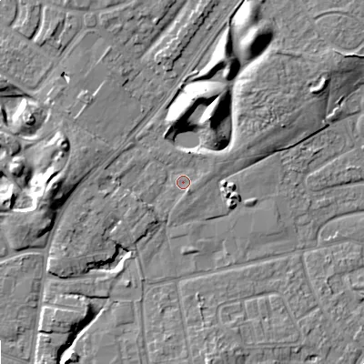Shaded relief map of the ground around WV12UE, computed from Environment Agency LiDAR. The ground here sits at about 133 m above sea level and falls 10 m across the surrounding 800 m. Surface water reaching this point runs off ground lying to the south-south-east, 1.5 m higher.