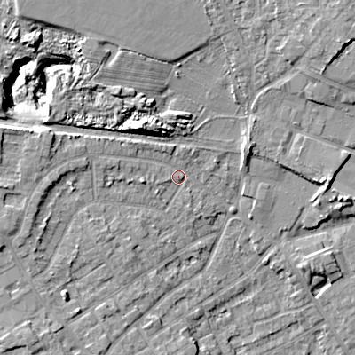 Shaded relief map of the ground around WV131AT, computed from Environment Agency LiDAR. The ground here sits at about 132 m above sea level and falls 14 m across the surrounding 800 m. Surface water reaching this point runs off ground lying to the west-north-west, 2.4 m higher.