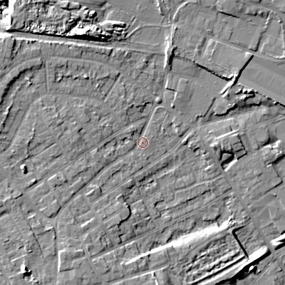 Shaded relief map of the ground around WV131AX, computed from Environment Agency LiDAR. The ground here sits at about 130 m above sea level and falls 13 m across the surrounding 800 m. Surface water reaching this point runs off ground lying to the north-north-west, 9.5 m higher.