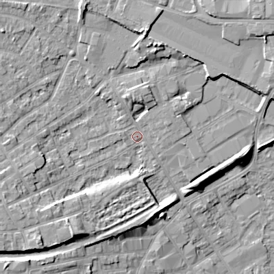 Shaded relief map of the ground around WV131ED, computed from Environment Agency LiDAR. The ground here sits at about 129 m above sea level and falls 13 m across the surrounding 800 m. Surface water reaching this point runs off ground lying to the north, 4.4 m higher.