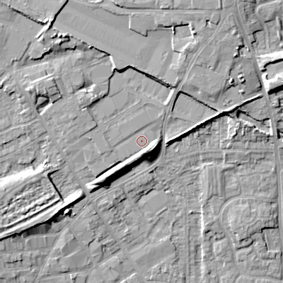 Shaded relief map of the ground around WV131LX, computed from Environment Agency LiDAR. The ground here sits at about 129 m above sea level and falls 14 m across the surrounding 800 m. Surface water reaching this point runs off ground lying to the north-north-east, 7.0 m higher.