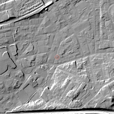 Shaded relief map of the ground around WV131QX, computed from Environment Agency LiDAR. The ground here sits at about 124 m above sea level and falls 14 m across the surrounding 800 m. Surface water reaching this point runs off ground lying to the west-north-west, 9.5 m higher.