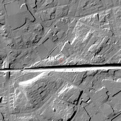 Shaded relief map of the ground around WV132HA, computed from Environment Agency LiDAR. The ground here sits at about 129 m above sea level and falls 18 m across the surrounding 800 m. Surface water reaching this point runs off ground lying to the south-east, 2.4 m higher.