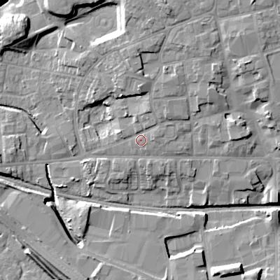 Shaded relief map of the ground around WV132PS, computed from Environment Agency LiDAR. The ground here sits at about 131 m above sea level and falls 13 m across the surrounding 800 m. Surface water reaching this point runs off ground lying to the north-north-east, 3.5 m higher.