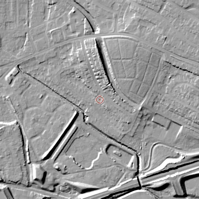 Shaded relief map of the ground around WV132RX, computed from Environment Agency LiDAR. The ground here sits at about 123 m above sea level and falls 22 m across the surrounding 800 m. Surface water reaching this point runs off ground lying to the north, 9.8 m higher.